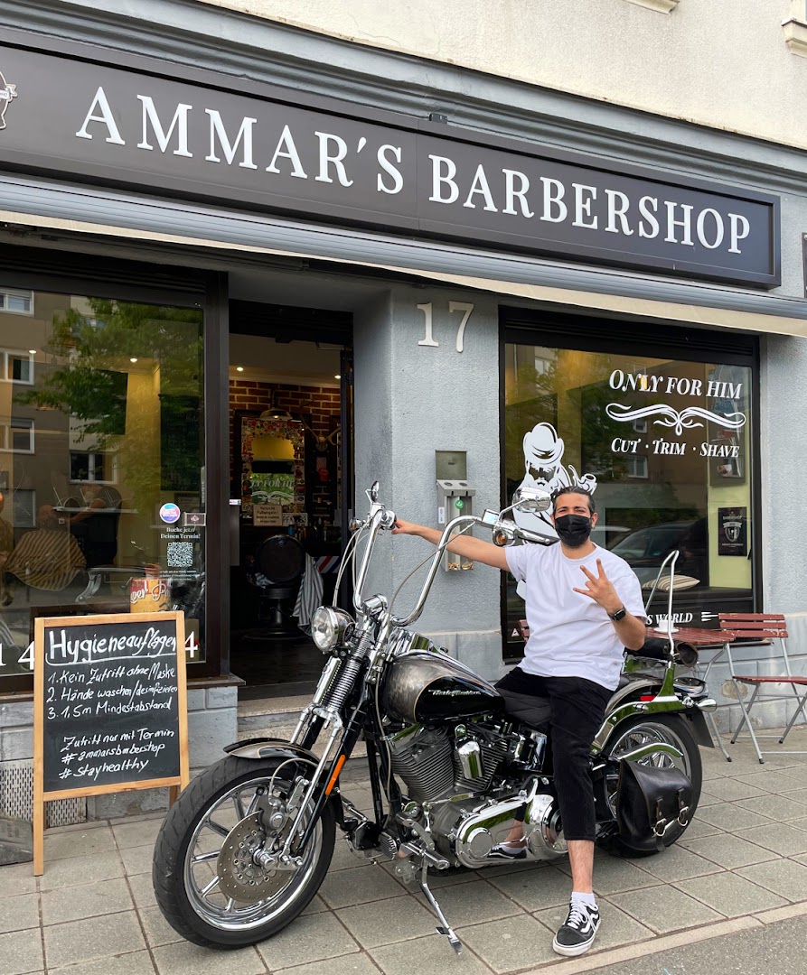 Ammar's Barbershop Fassade mit Harley davor